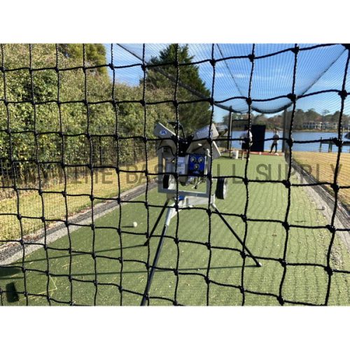 Hack Attack 3 Wheel Pitching Machine rear view inside batting cage