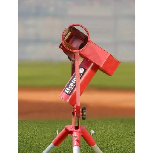 heater sports pro real curveball pitching machine on the field close up view