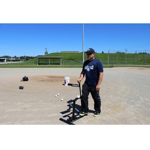 louisville slugger black flame pitching machine on the field with person