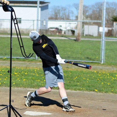 louisville slugger soft toss pitching machine batting tee player batting practice side view