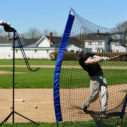 louisville slugger soft toss pitching machine batting tee with player behind the net