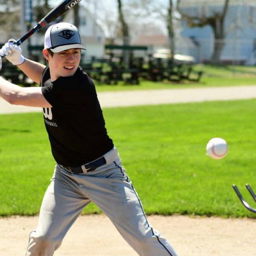 louisville slugger soft toss pitching machine batting tee with player side view